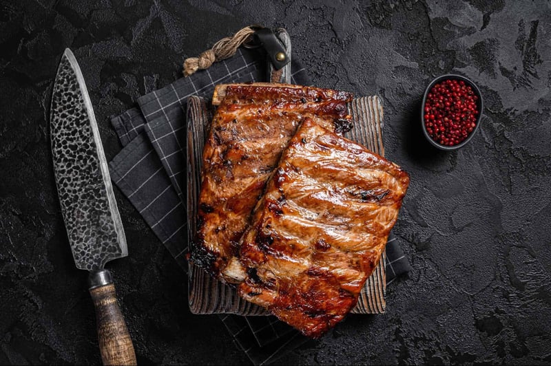 Delicious, juicy grilled pork ribs with smoky flavor, perfect for BBQ lovers.