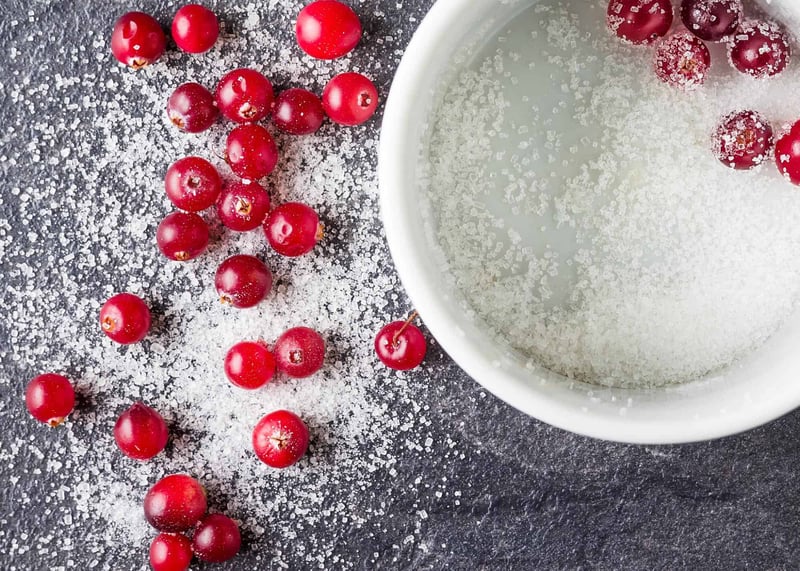 Cranberries and sugar, perfect for holiday recipes and desserts.