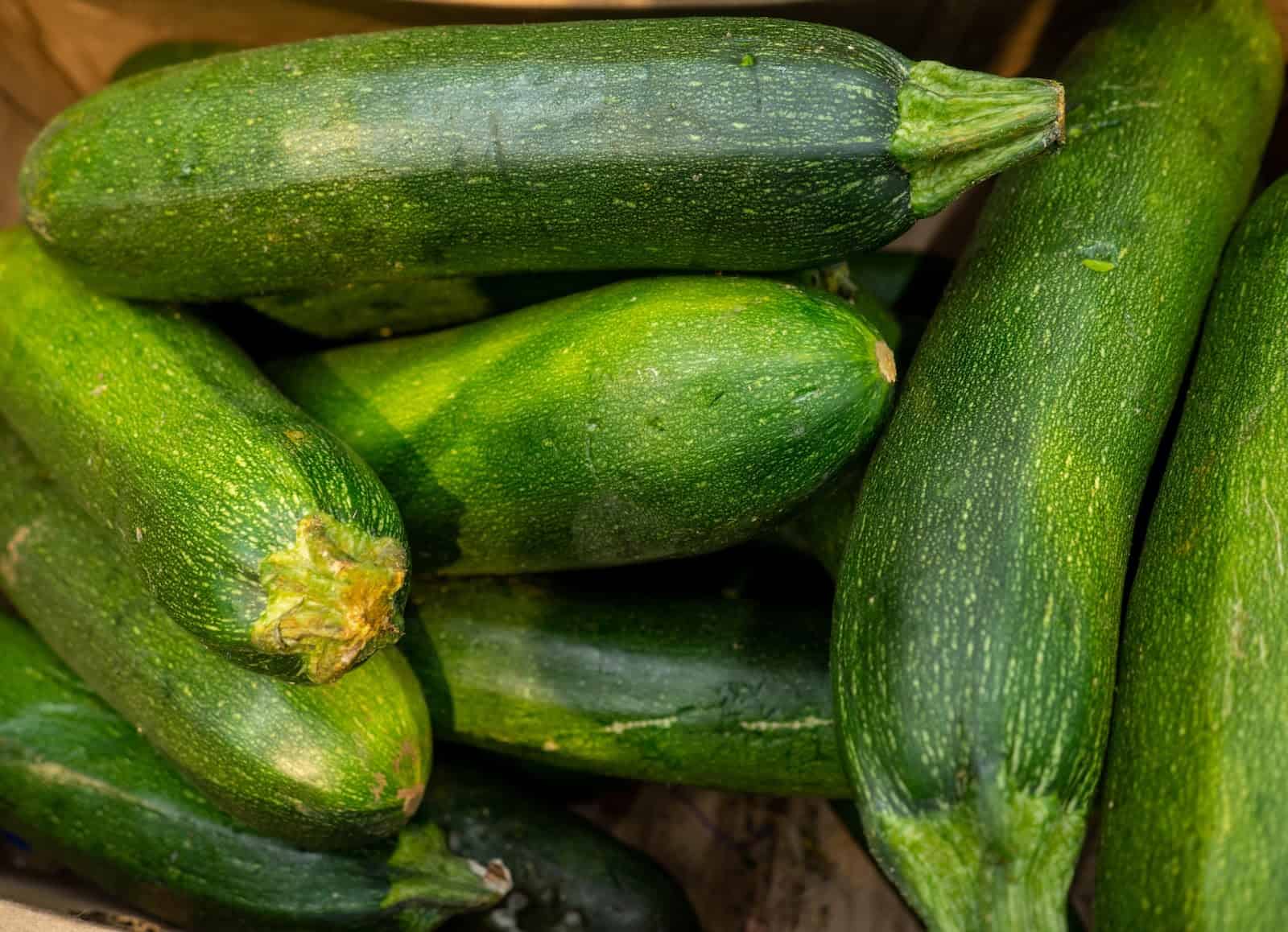 Fresh green zucchinis in a basket for nutritious meals.