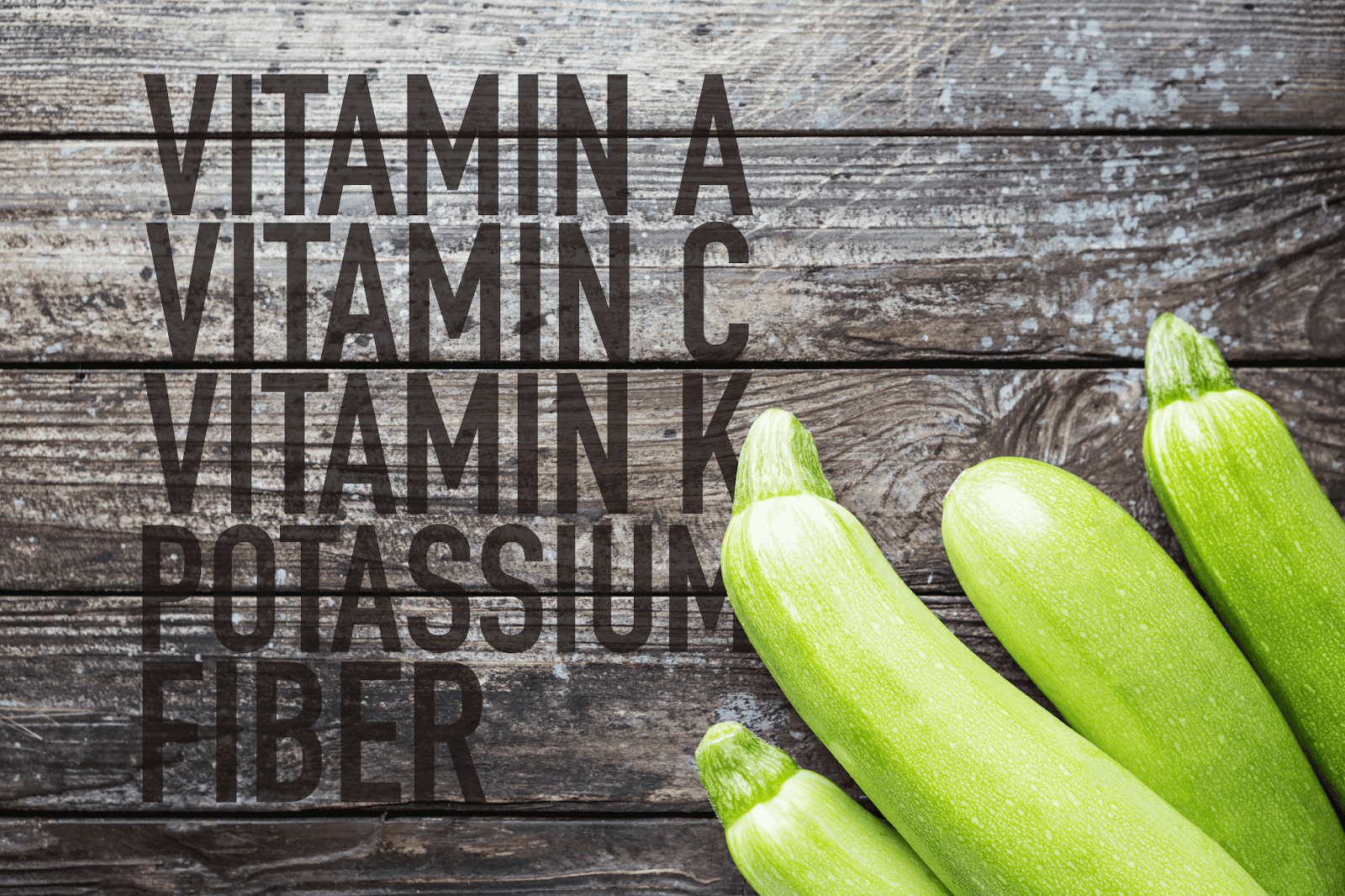 Colors: Green, Fresh Vegetables, Zucchini on Rustic Wooden Background.