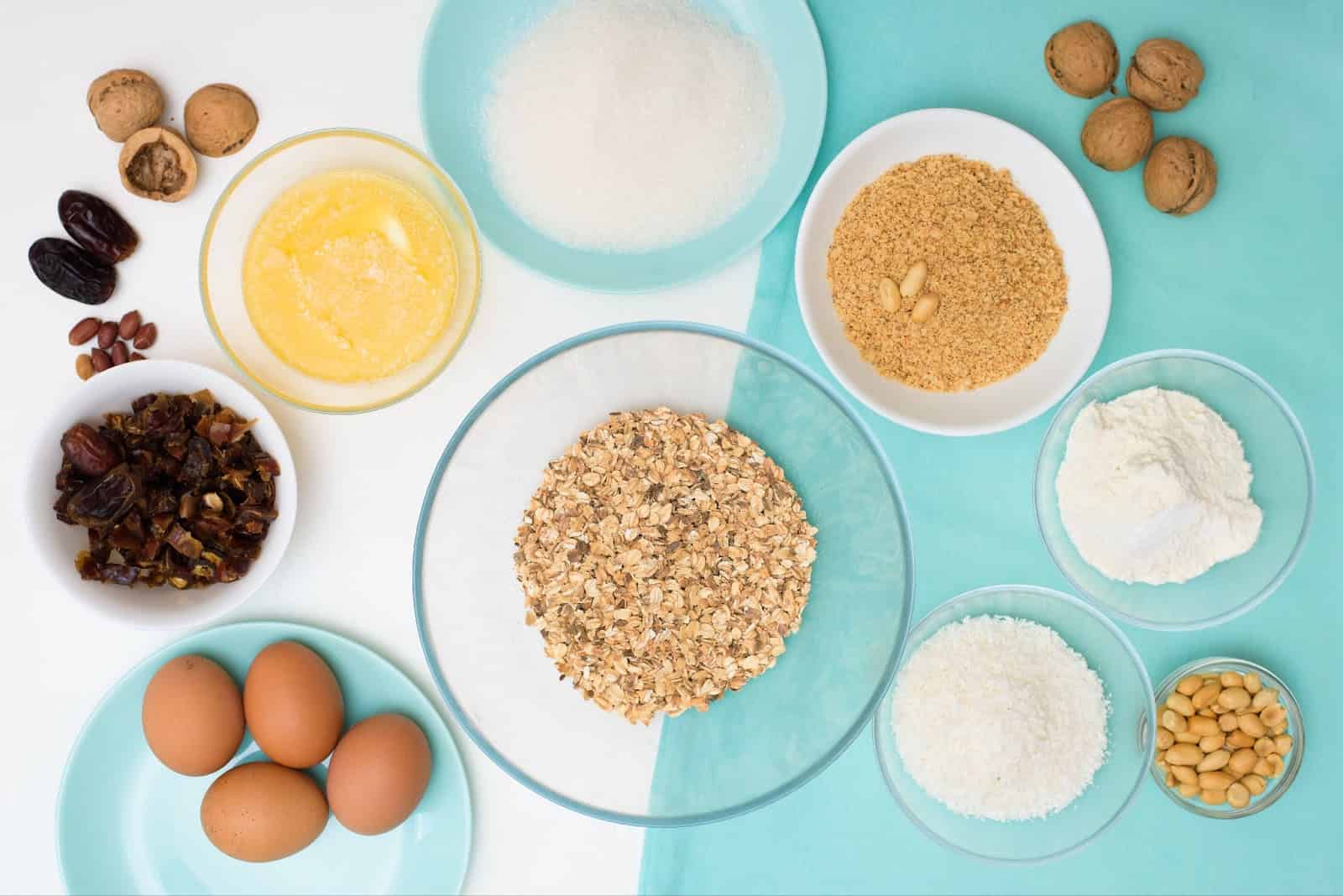 Healthy dog treats with oats, eggs, dried fruit, and nuts for homemade dog diet.