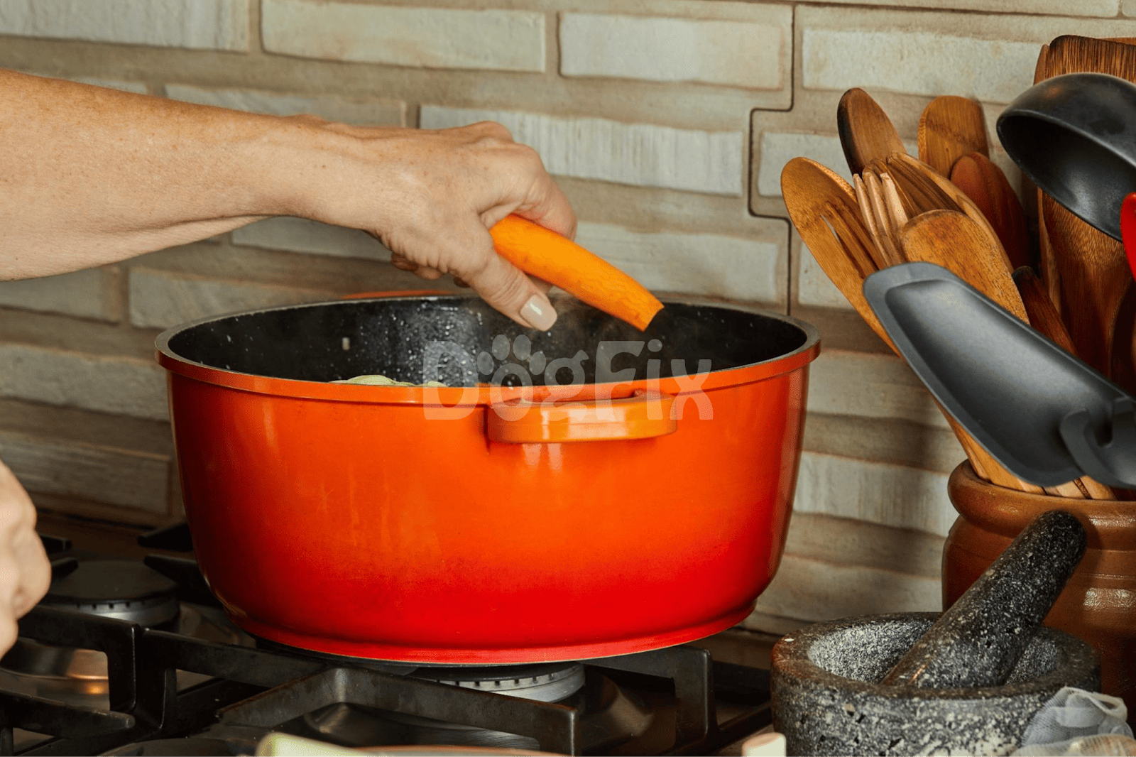Close-up of a person adding a carrot to a cooking pot in a kitchen scene.