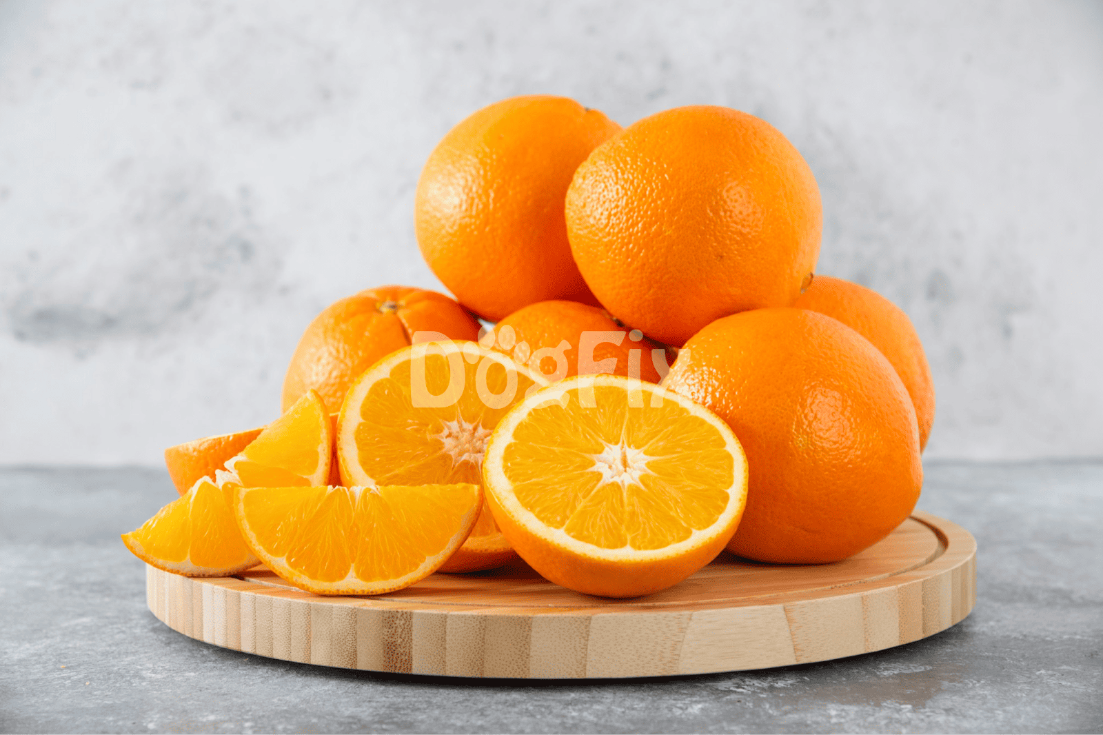 Citrus oranges on a rustic kitchen surface, perfect for healthy fruit snacks and vitamin C boost.