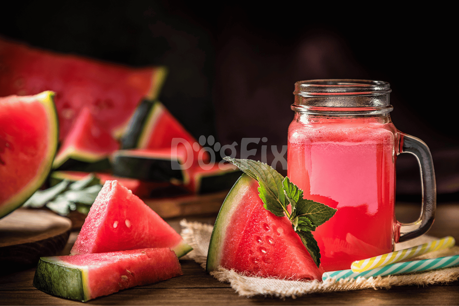 Refreshing watermelon juice served in a mason jar with fresh watermelon slices and mint garnish.