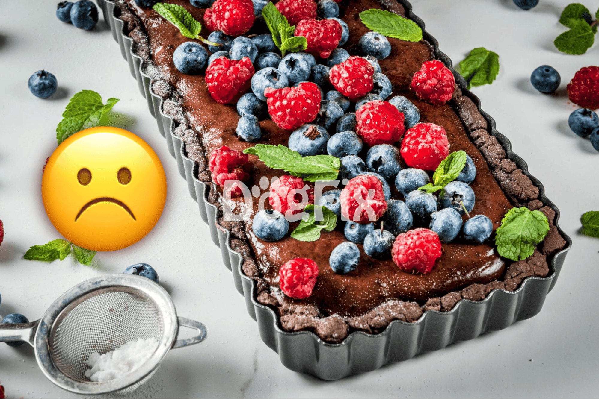 Delicious berry tart topped with raspberries, blueberries, and mint leaves, perfect for summer desserts.