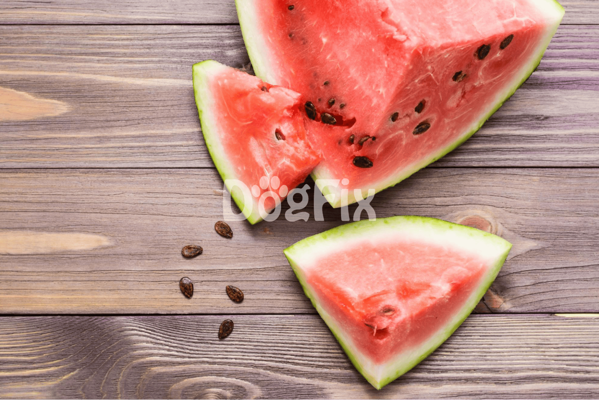 Fresh watermelon slices on rustic wooden table, juicy and sweet summer fruit with black seeds.