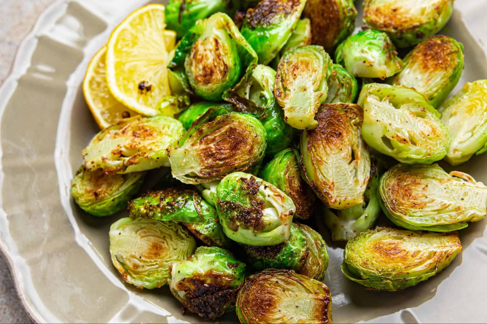 Healthy roasted Brussels sprouts with lemon slices for a nutritious, flavorful side dish. Perfect for dinners and gatherings.