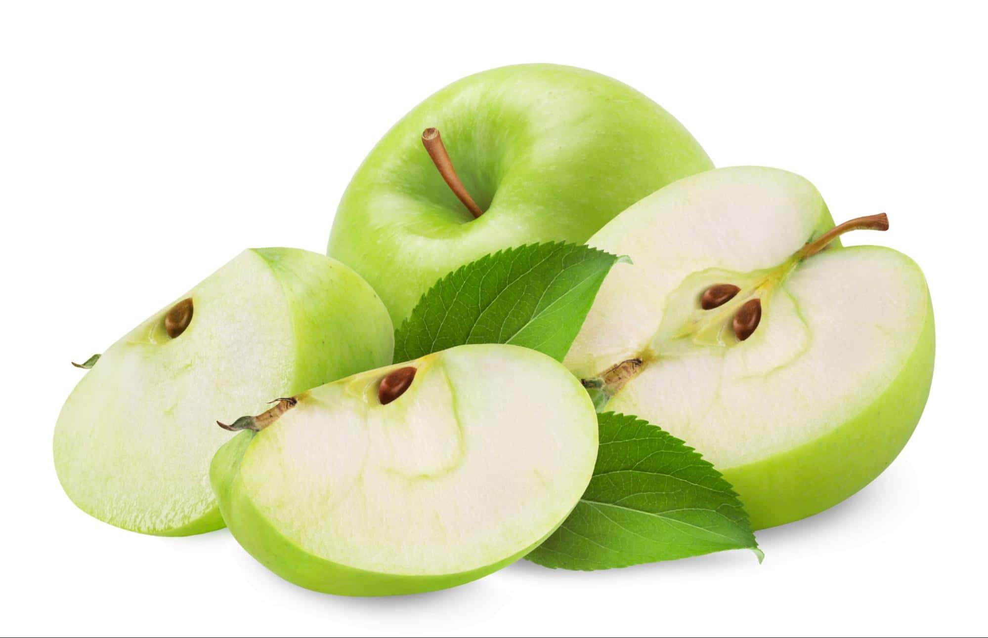 Close-up of fresh green apple slices and a whole apple with leaves, perfect for healthy dog treats.