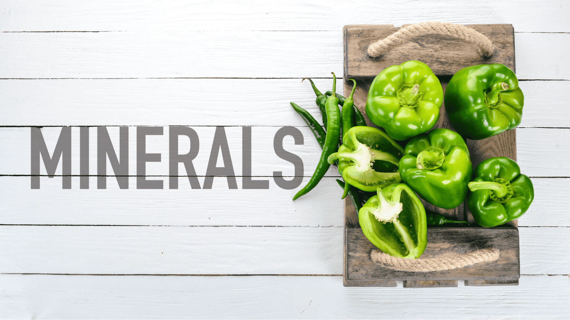 Fresh green peppers and chili peppers on wooden tray for dog nutrition.