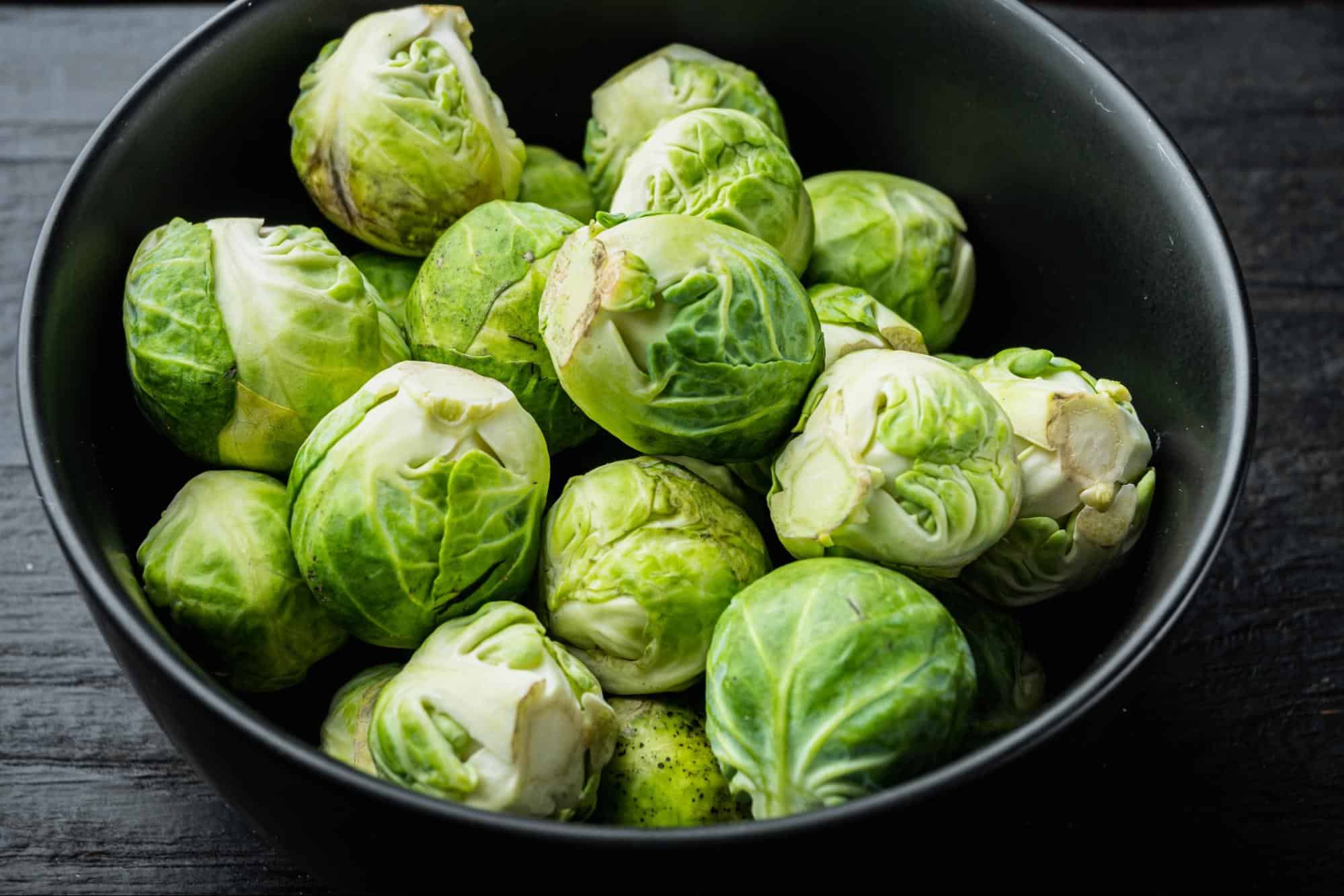 Vibrant green Brussels sprouts, known for health benefits for dogs and enriching their diet.