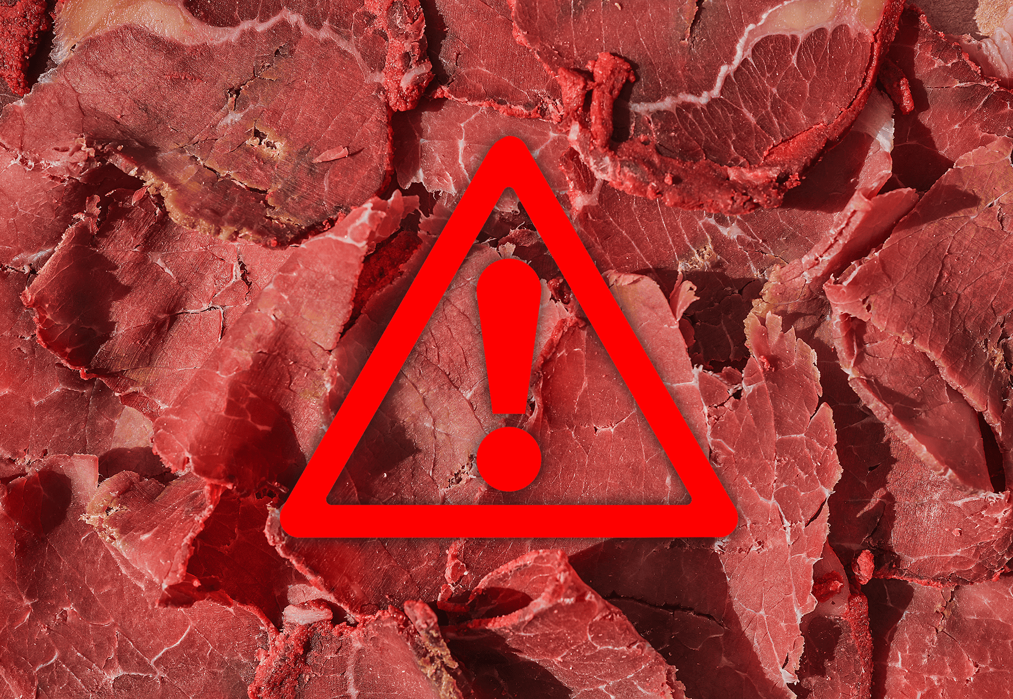 Red warning sign over raw meat, indicating potential health hazards for dogs.