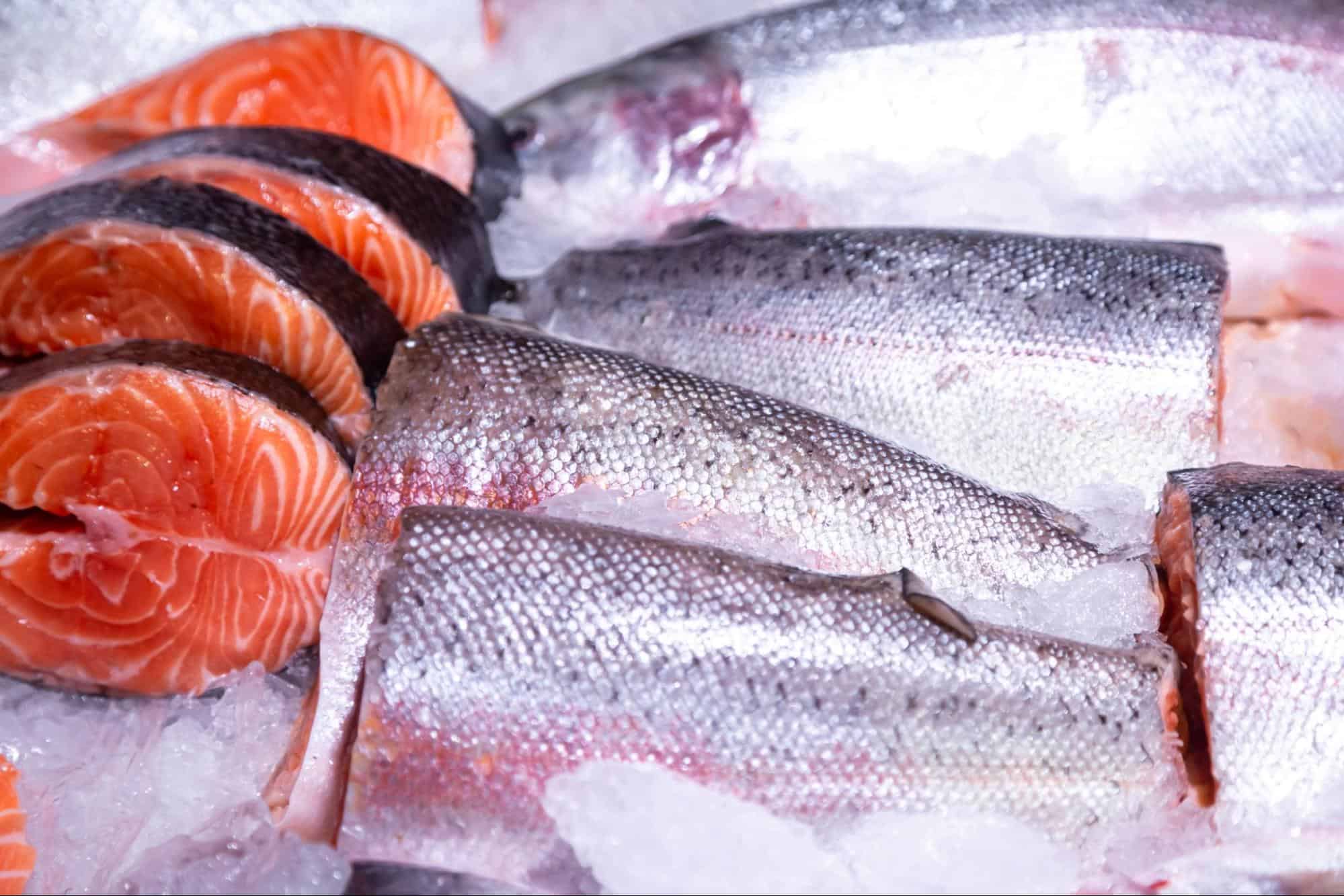 High-quality salmon fillets on ice, ready for fresh seafood delivery or cooking.
