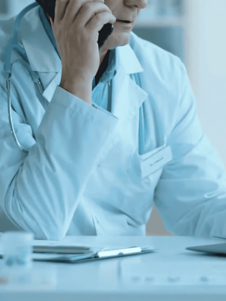 Veterinarian on phone, urgent pet vet assistance, animal emergency contact.