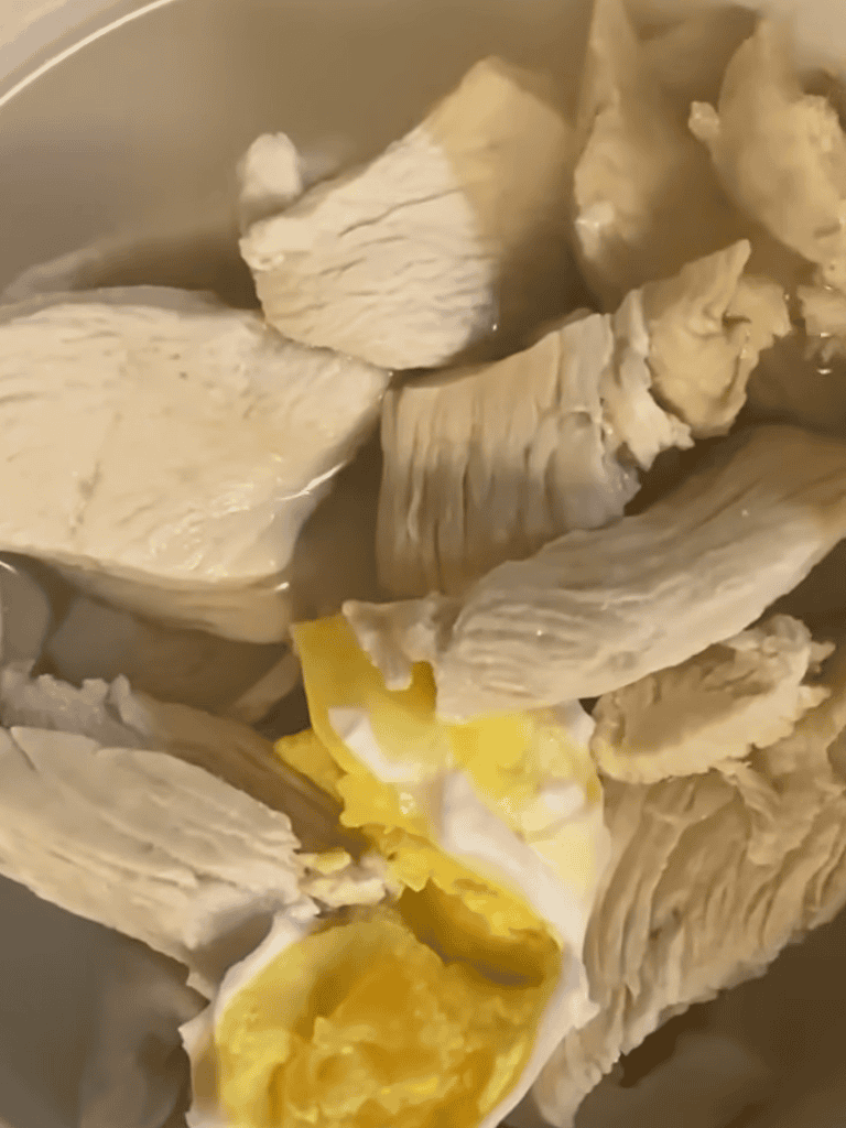 Fresh cooked chicken for dogs, healthy meat for pet nutrition.